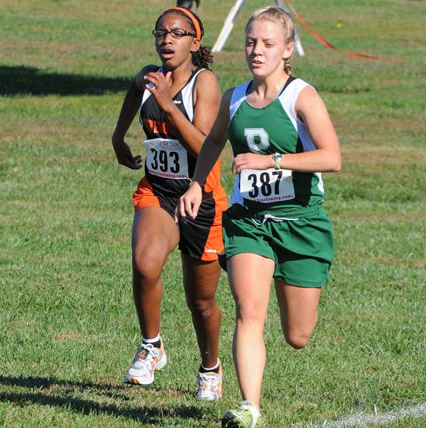 Senior Daisia Baker competes in a cross country event.  Baker was a four-year letterwinner for the sport.