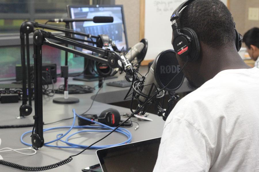 Junior Johnnell Ball records programming for KRHS 90.1 FM, Ritenour High Schools radio station