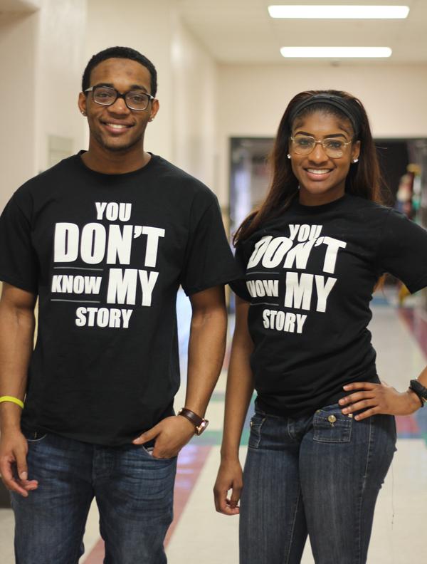 Seniors James Pulliam and Kamara Dunn show off their ‘You don’t know my story’ shirts, which can be purchased by all students in support of the Thomas Mitchell Scholarship. 