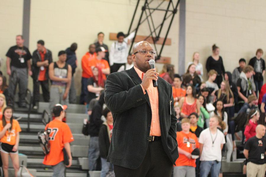 Dr. Anthony Robenson address the student body at the beginning of the assembly 
