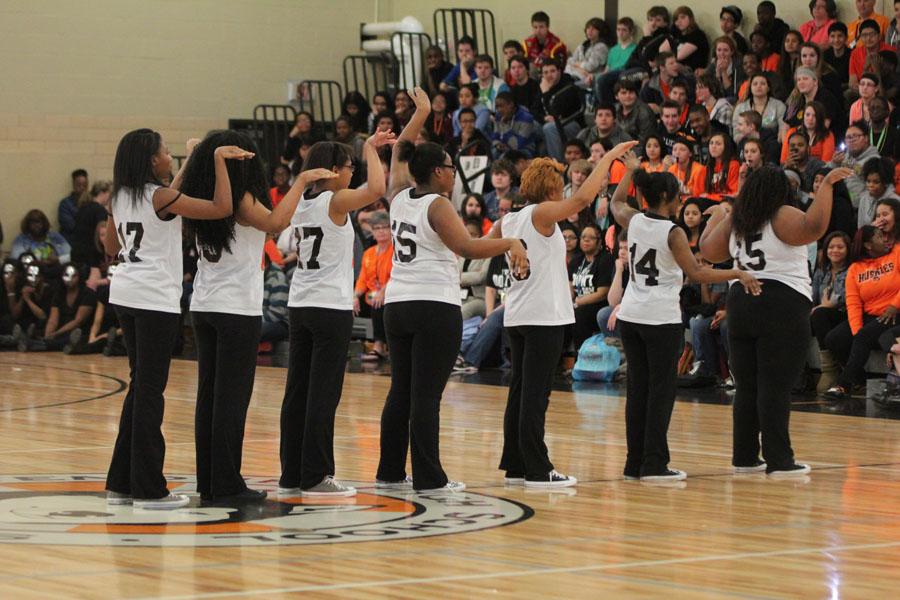 The JV Rhymettes preforms during the spring assembly  
