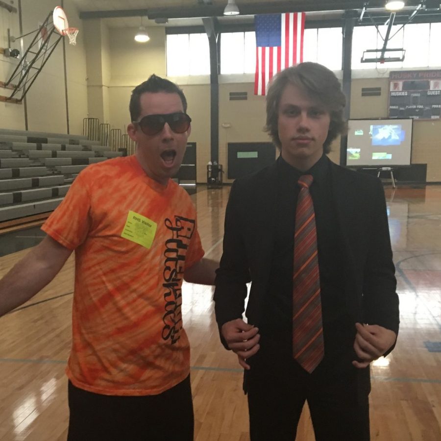 Co-Host Principal Brian Rich and Senior Rance Drexler clown around before the assembly.