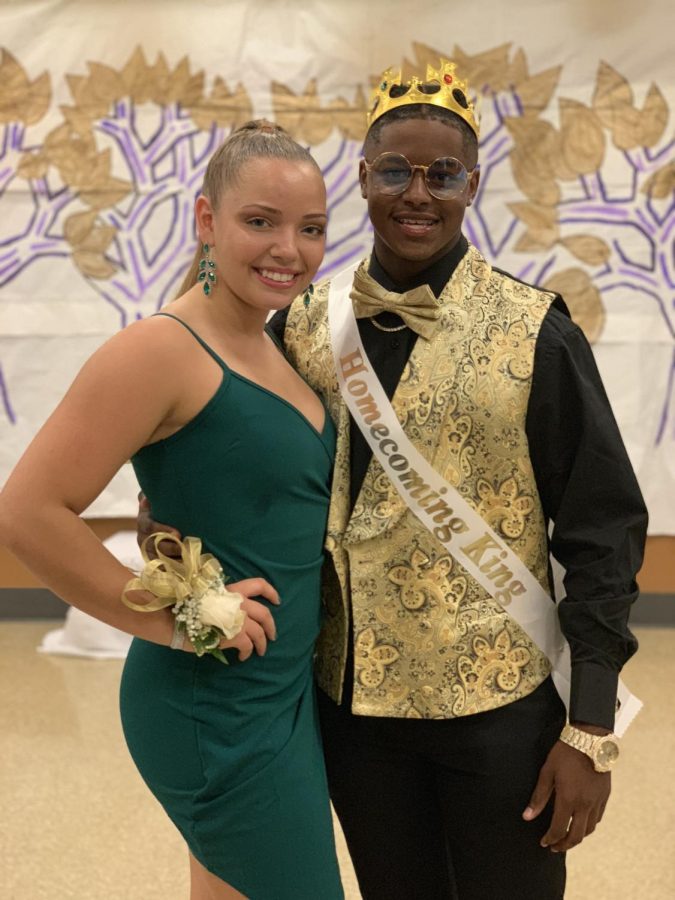 DeShawn+Gaitlin+celebrates+being+crowned+Homecoming+King+with+date+Ava+Besterfeld.+