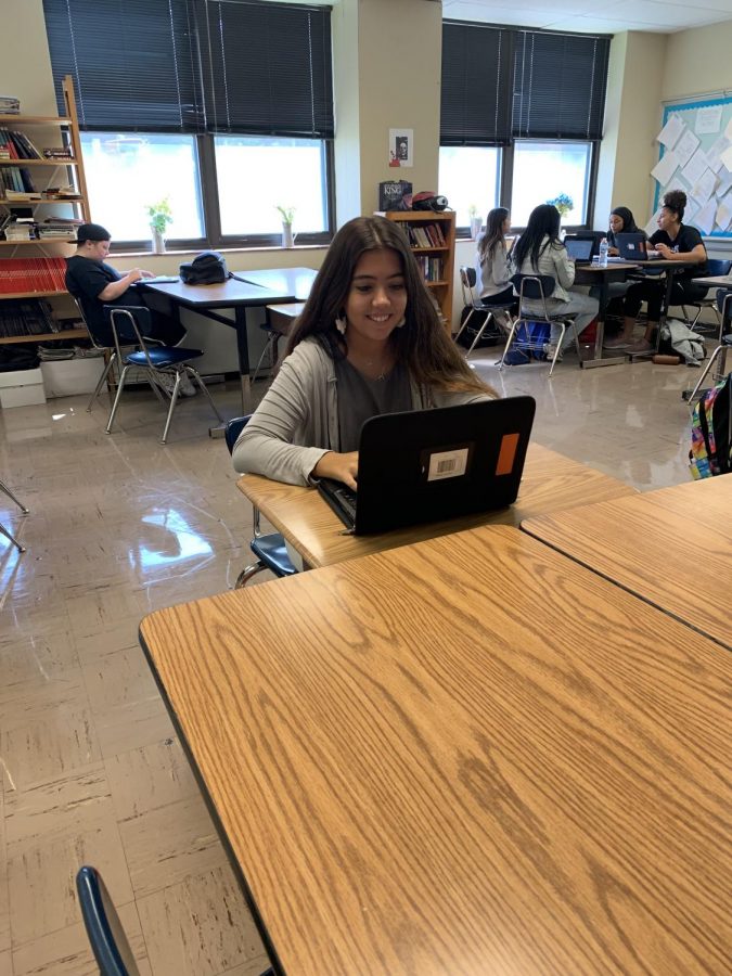 Senior Carlota Gili works on her Chromebook in class.  Gili came to Ritenour from Spain to spend her senior year in the United States.  