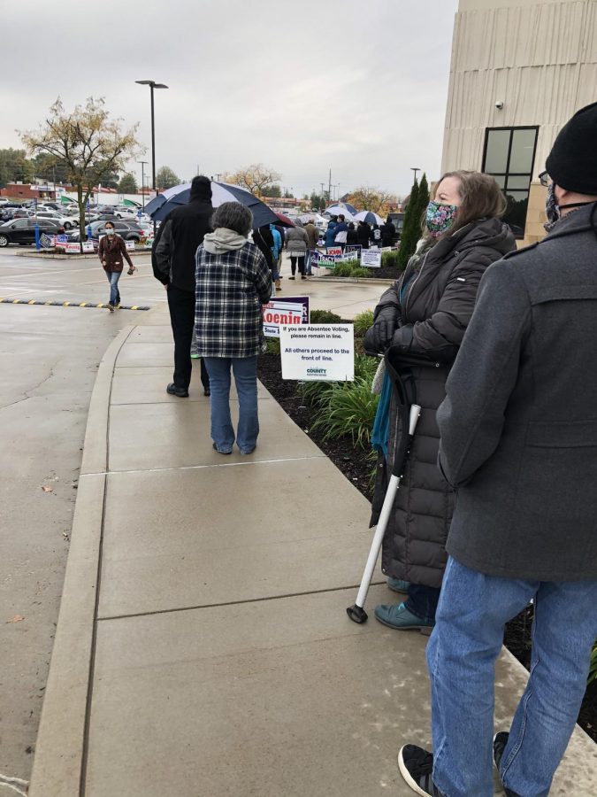 Voters wait in line at the County Government Center in Northwest Plaza for absentee voting. An expected increase in voting is happening due to the presence of COVID-19, so absentee voting
has expanded in this presidential election cycle.