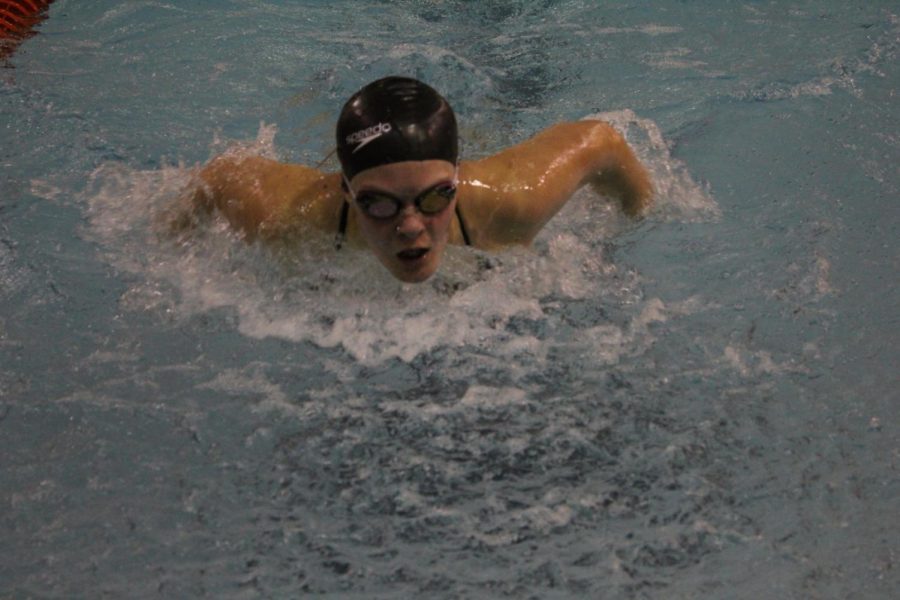 Senior Jayden Frost competes for her senior night in a meet against University City on February 11.