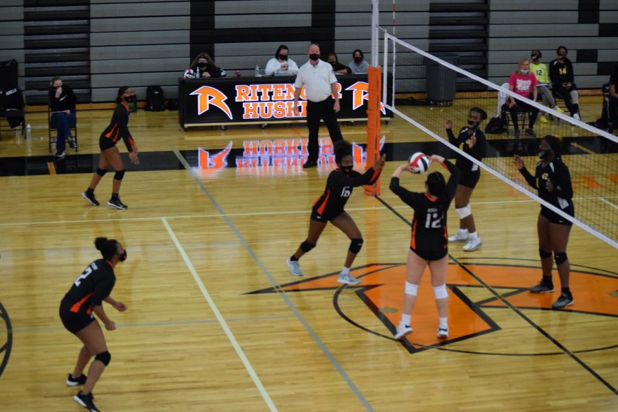 The girls volleyball team competes in a game in Costilow Fieldhouse during the 2021 season.  As recently as 1981, the girls only played in the small gym while the boys hosted all of their games in the fieldhouse. 