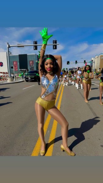 Sophomore Lailah Betton performs with her dance troupe at the St. Patrick's Day Parade in downtown St. Louis.