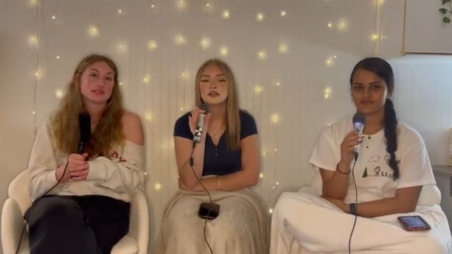 Juniors Grace Key, Olivia Curd, and Julia Abdelhalim speak to each other during episode of their podcast. 